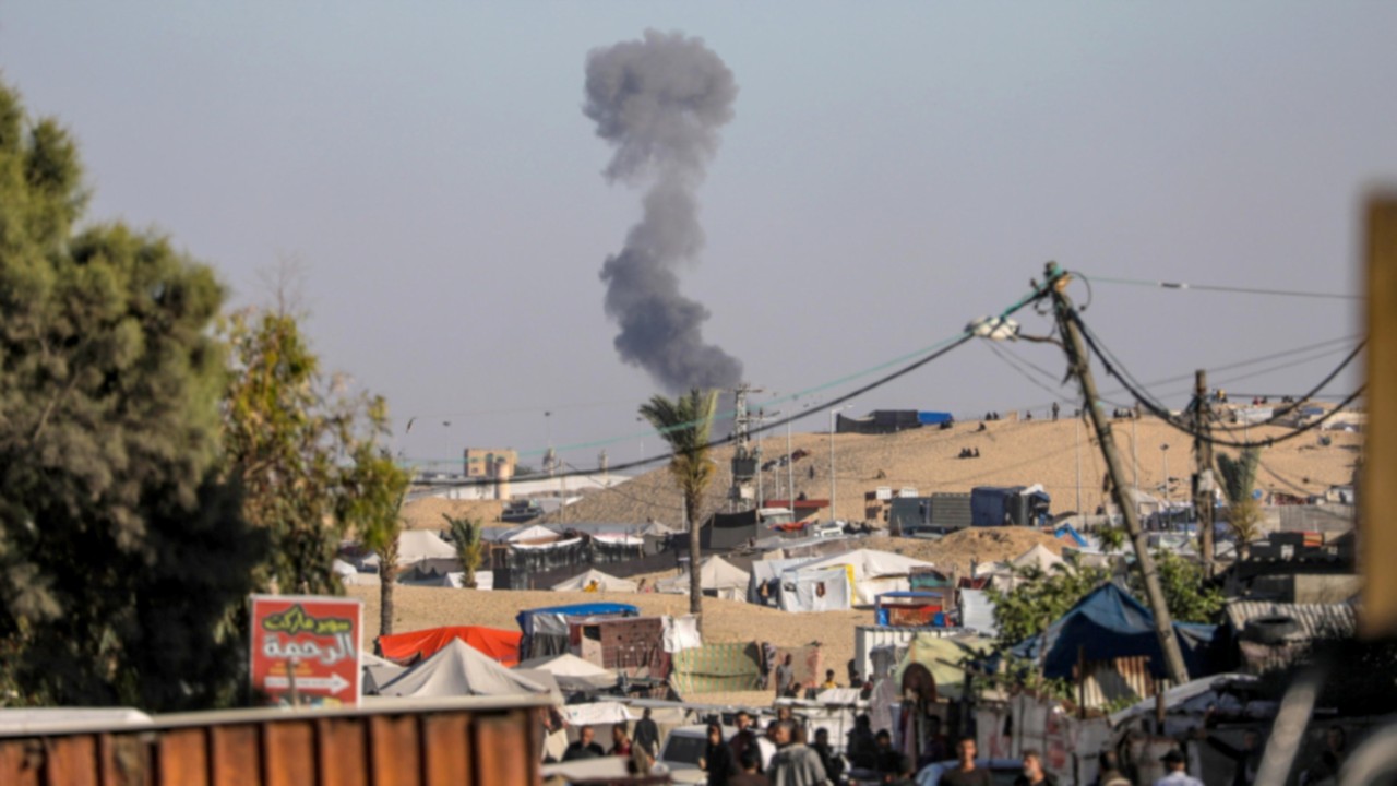 epa11326106 Smoke rises after an Israeli air strike in Rafah, southern Gaza Strip, 07 May 2024 ...