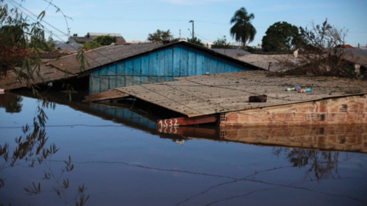 TOPSHOT - View of a flooded house in the Rio Branco neighborhood in Canoas, Rio Grande do Sul state, ...